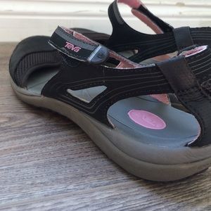 Teva closed toe sandals.