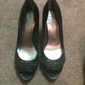 Guess open toe heels with pretty metal accents.