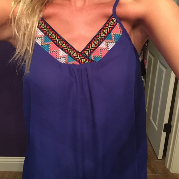 Super cute Royal blue tank top with switch detail