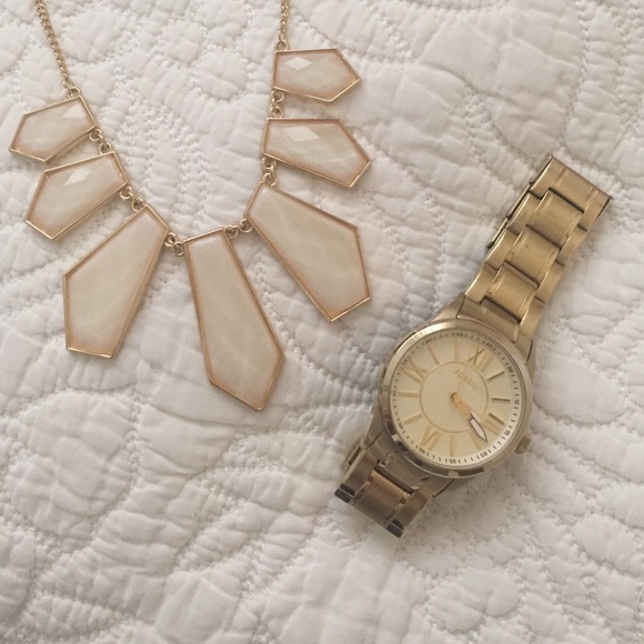 Women's gold fossil watch