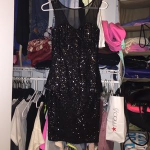 Black Sparkly Peplum Dress from Bebe