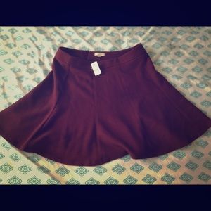LOFT bouncy zip wine colored skirt size 12