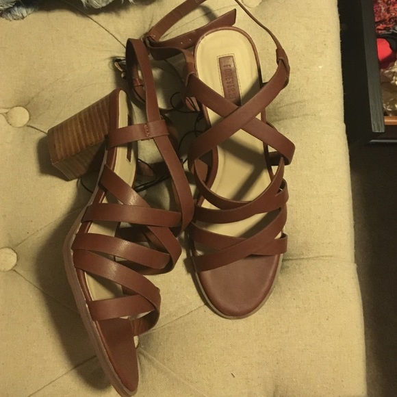 Brown sandals with tiny heel