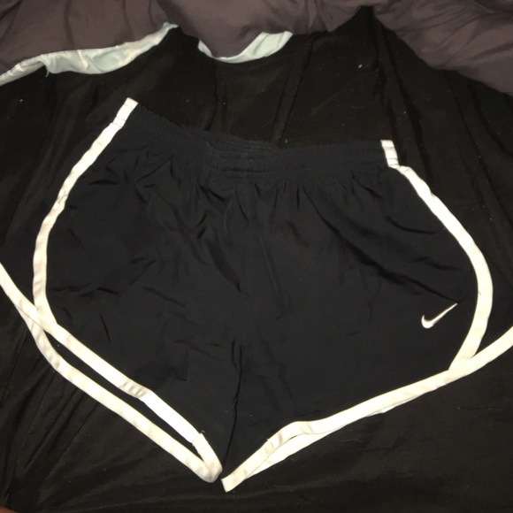 Black Nike running shorts