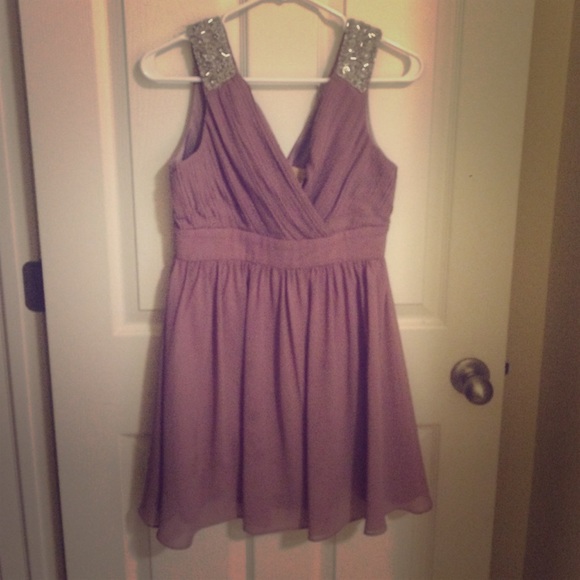 Mauve color dress with sequence on the shoulders.
