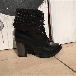 Metal accent badass booties