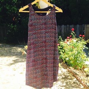Super comfy and cute summer dress! Lightly worn.