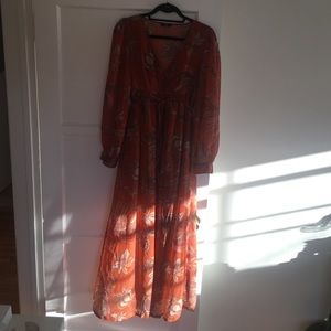 Beautiful maxi dress with gold tassel details