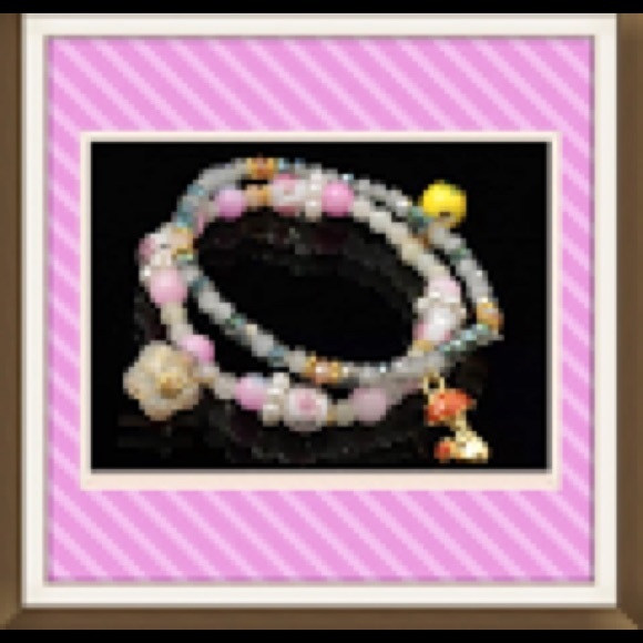 CLEARANCE Brand New multi colored charm bracelet.