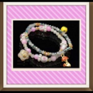 CLEARANCE Brand New multi colored charm bracelet.