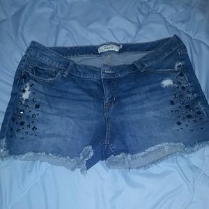Frayed Jean shorts with metal embellishments