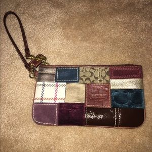 Patterned Coach wristlet