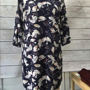 Navy blue sheath dress with 3/4 sleeves. Birds