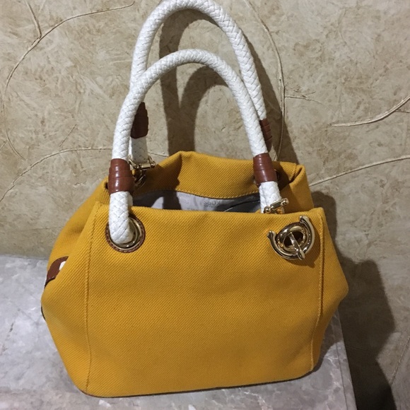 63 off Michael Kors Handbags Michael Kors mustard bag from Jossina's