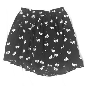 black skirt with white bows