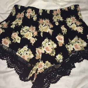 flower print shorts with crochet detailing