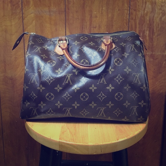LOUIS VUITTON Speedy Monogram Canvas 25 Satchel