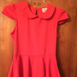 Coral peplum top NWOT