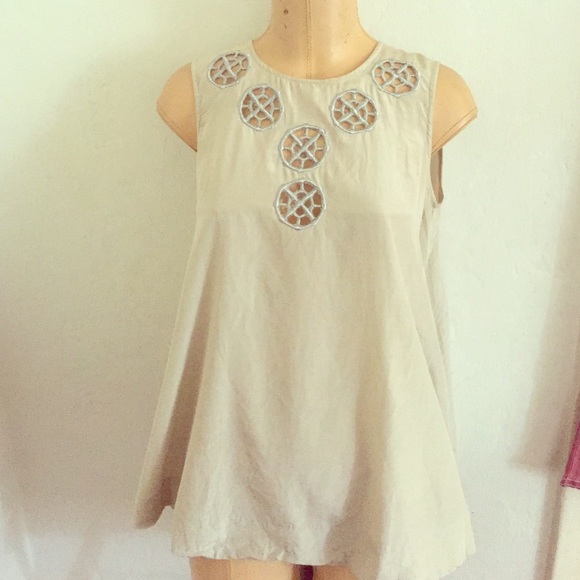 Beige Sleeveless chic top with flare