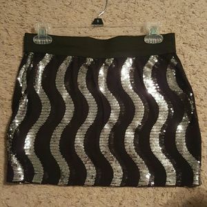 Black and silver sequin skirt.