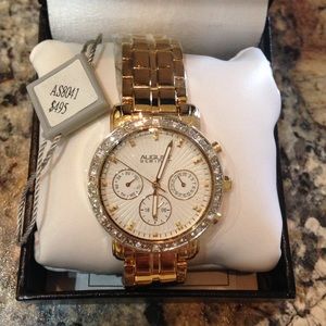 Brand new gold watch with crystals