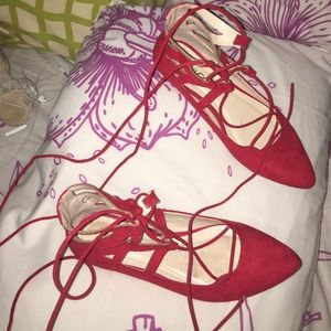 Red crisscross straps flats