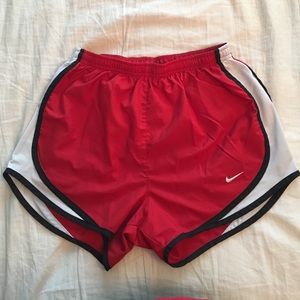 red Nike shorts