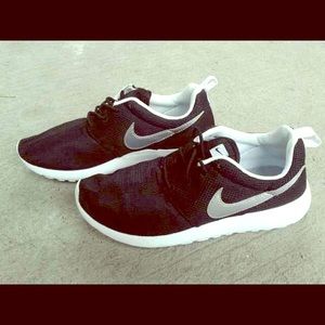 Black with silver check Nike roshes