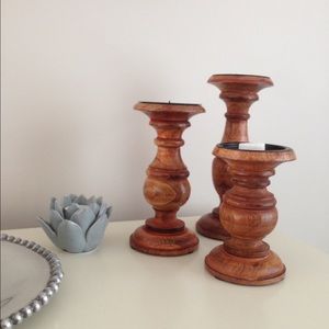Three candlestick holders