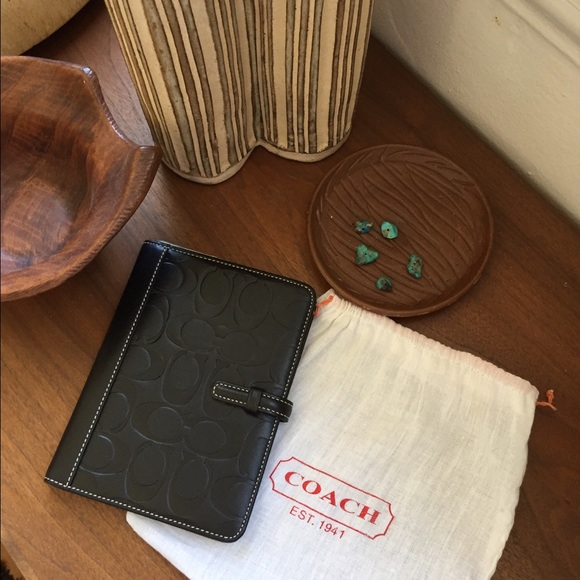 Pristine black monogram Coach photo album.