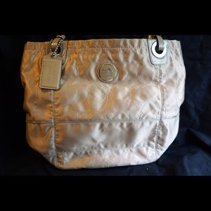 Imitation Coach Gold Purse