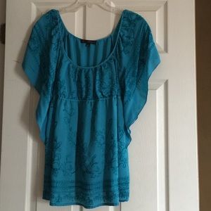 Turquoise empire waist top.