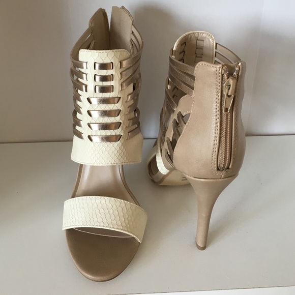 Nude heels with cream detail. Size 8.