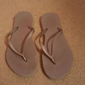 Silver/gray flip flops