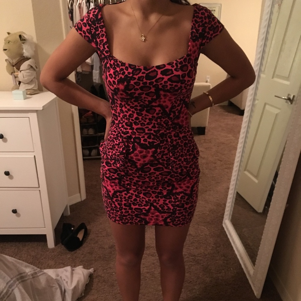Leopard print peplum body con dress