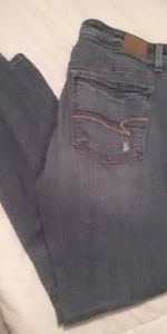 Worn Denim ripped blue jeans