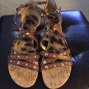 Guess strappy sandal with gold studs.