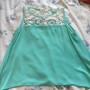 A light blue tank top