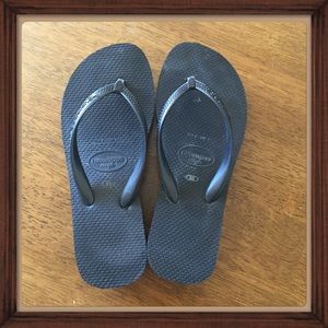 Black wedge flip flops