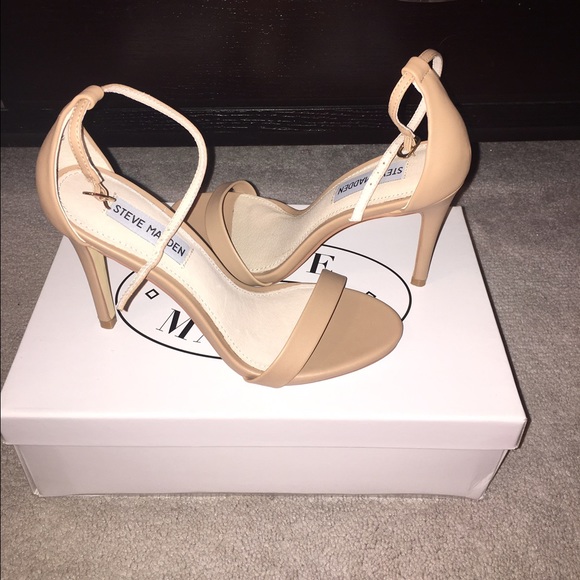 Tan Steve Madden ankle strap heels.