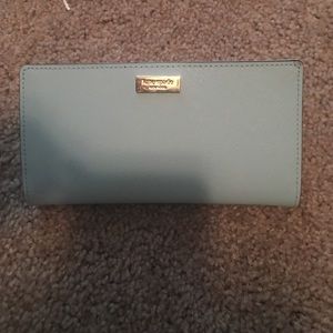 Kate spade baby blue wallet.
