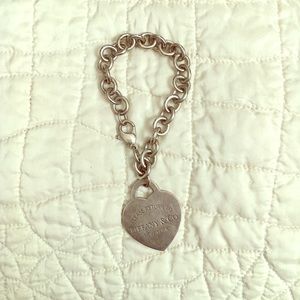 Return to Tiffany and Co silver charm bracelet.