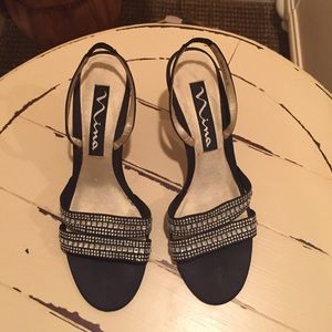 Used black Nina dress heels with crystal detail