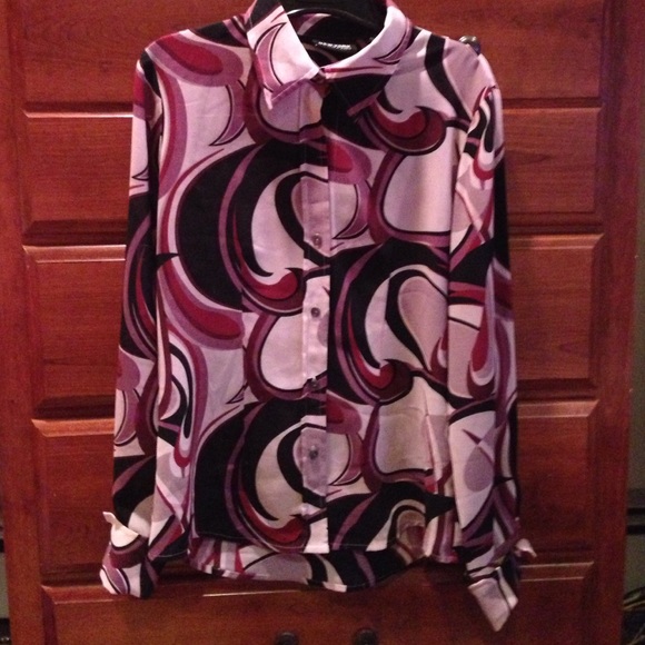 Gently worn multi color button down blouse.