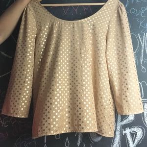 Fashionable shimmery loose top