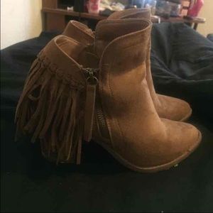 Booties with fringe.