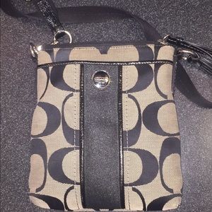 Grey and black coach crossbody bag