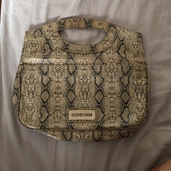 Animal print snake skin clutch. - Picture 1 of 2