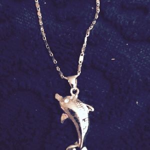 A 925 Sterling Silver Dolphin Charm and chain