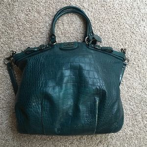 Coach, slightly used. Great condition.